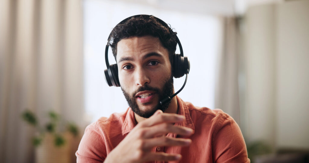 a man speaking into a headset